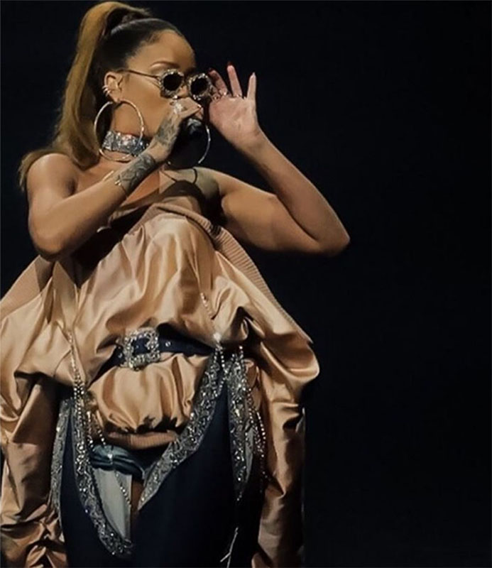 Wearing her own design for Manolo Blahnik, this $4,000 pair of stiletto-heeled boots aren't the only 'wow' factor with this outfit - the satin bustier bomber by Fortie and Lynn Ban sunnies are not to be upstaged.