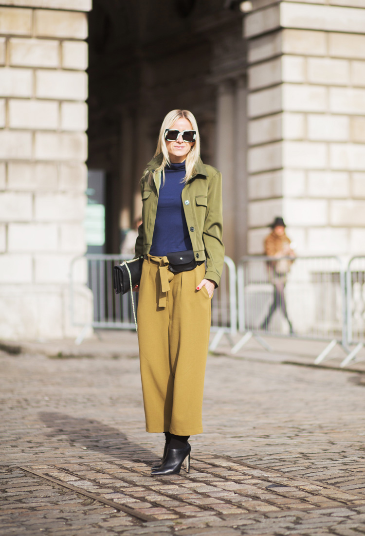 Celine Aagaard wears Topshop with sunglasses by Celine, bag by Valentino and boots by Alexander Wang. 