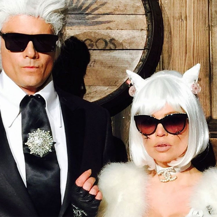 @Fergie and hubby Josh Duhamel dressed up as (a very chiseled) Karl Lagerfeld and his cat Choupette.