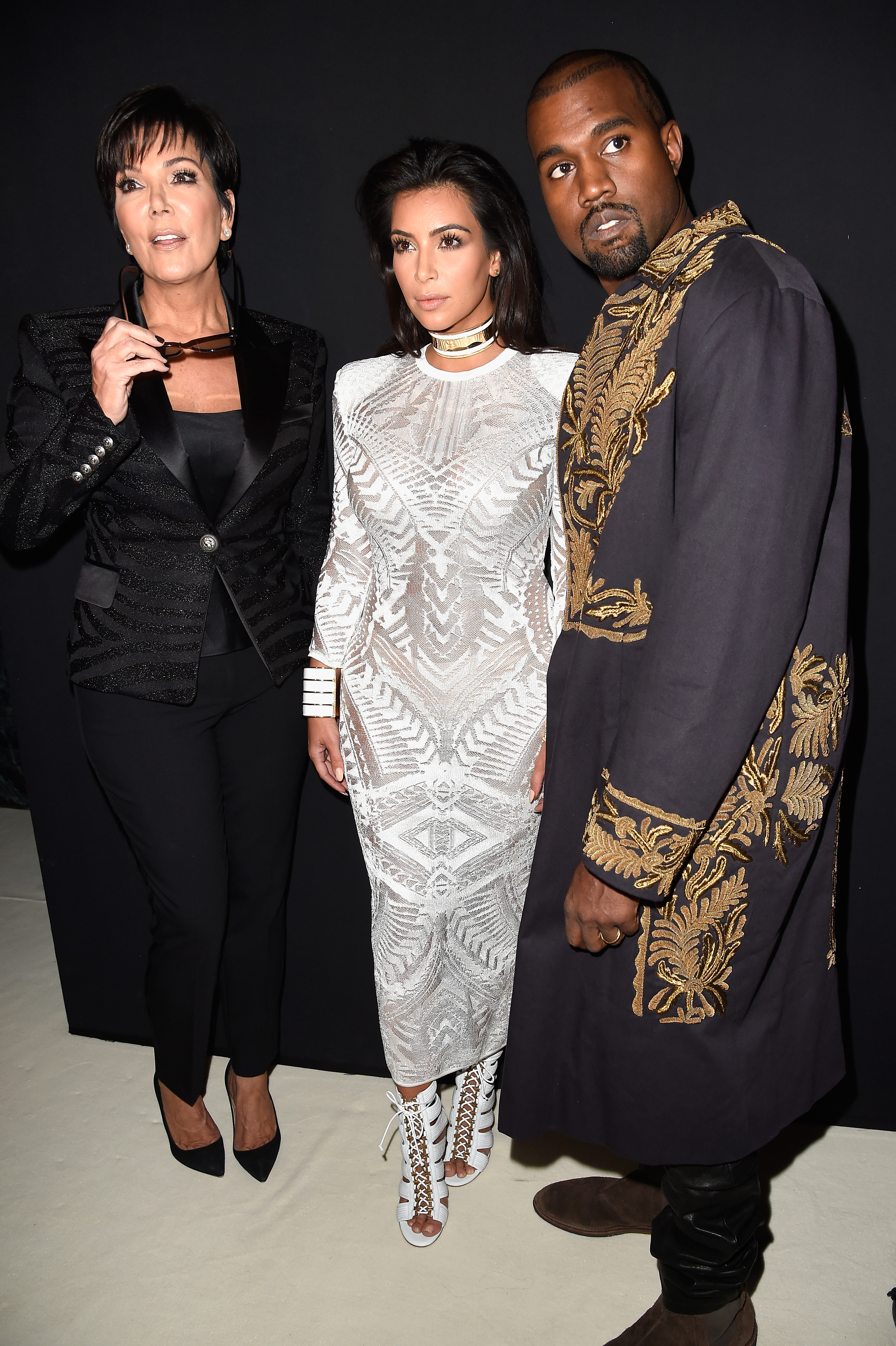Kris Jenner, Kim Kardashian and Kanye West attend the Balmain show as part of the Paris Fashion Week Womenswear SpringSummer 2015 on September 25, 2014 in Paris, France