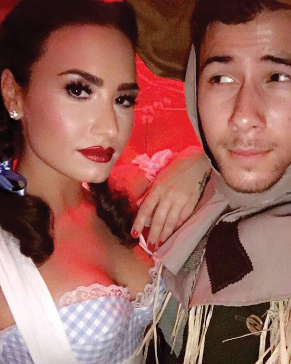 Demi Lovato and @nickjonas went as Dorothy and the scarecrow from The Wizard of Oz.