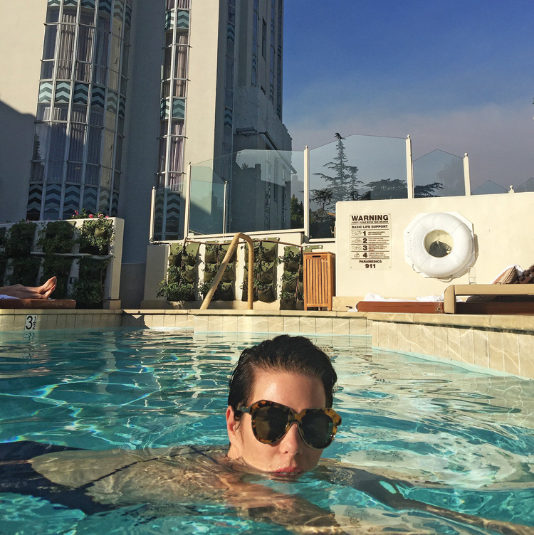Designer Karen Walker in the Sunset Tower Hotel pool.