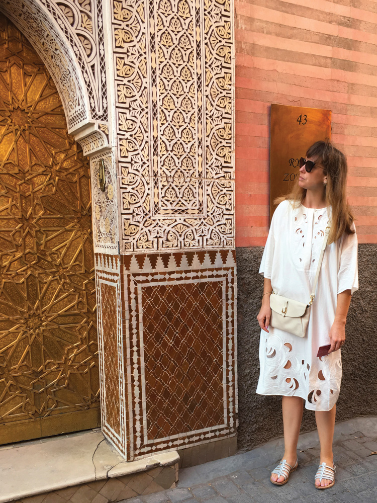 Zoe at the entrance to a riad (a traditional Moroccan house or hotel) in the medina (old walled city).