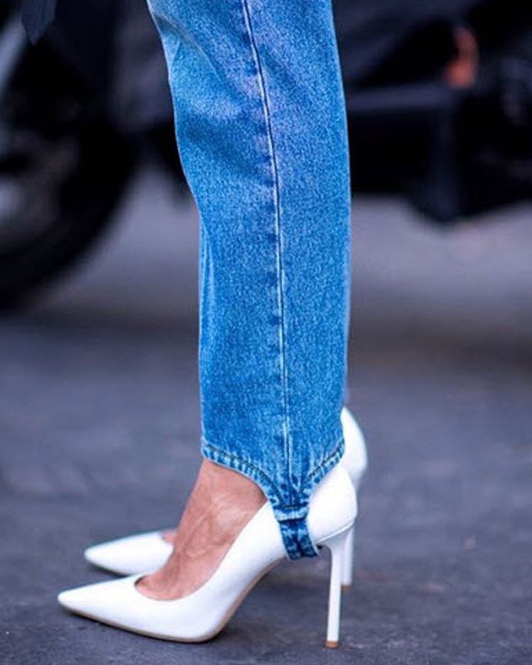 The 80s Stirrup Pants Trend Is Back & It's Not Going Away Anytime