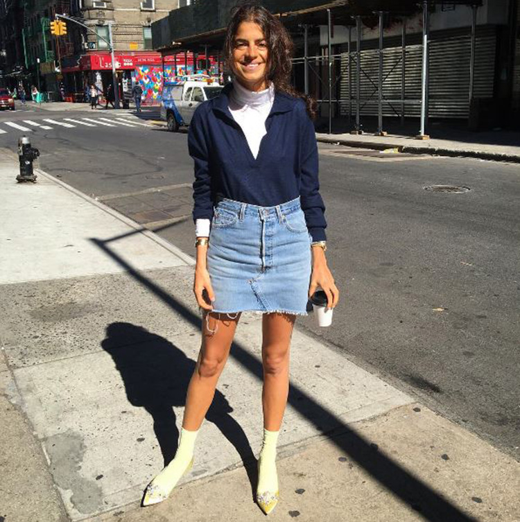 Out and about in New York, Leandra inspiring us all to go out and buy a denim skirt.