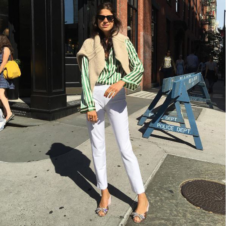 Last but not least, this classic shirt and jeans combo. Accessorised with a draped sweater and embellished flat, it's one of our favourite Leandra looks of all time.