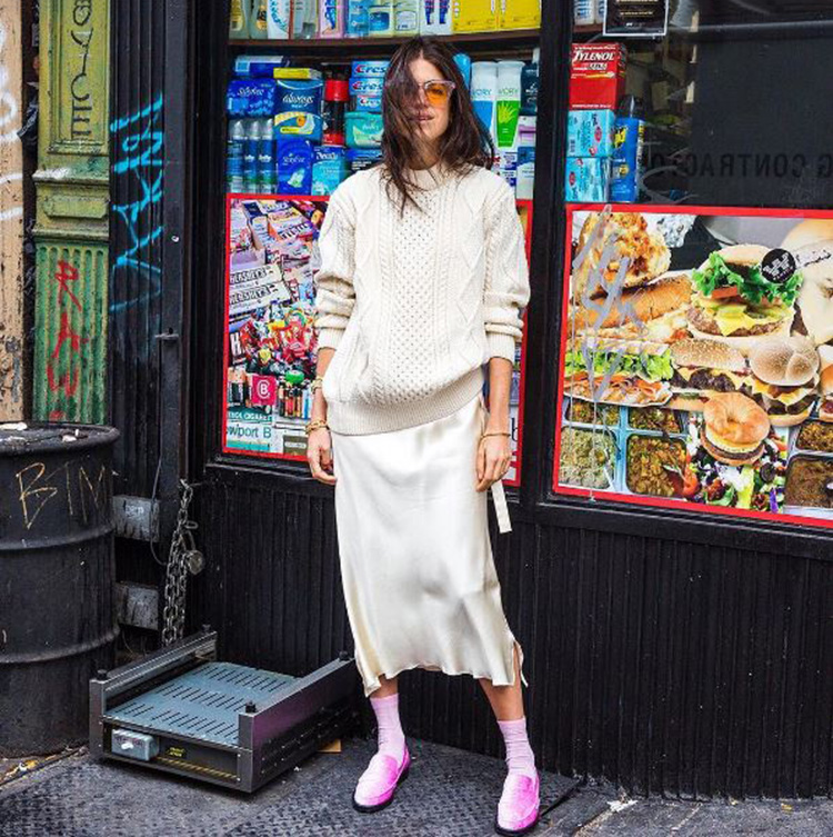 Wearing her newly-released MR by Man Repeller statement loafer with a chunky knit. And socks. (Always socks). The perfect way to update a silk slip dress.
