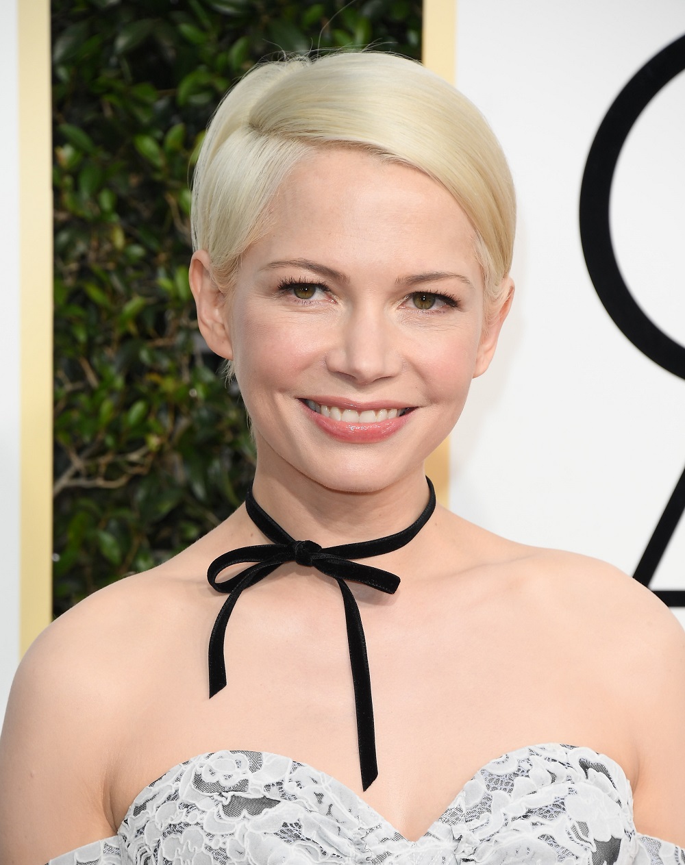 Michelle Williams with sleek pulled back hair at the 2017 Golden Globes