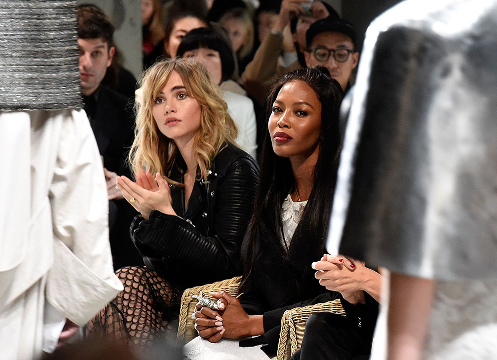 LONDON, ENGLAND - FEBRUARY 20: (L-R) Suki Waterhouse and Naomi Campbell wearing Burberry attend the Burberry February 2017 Show during London Fashion Week February 2017 at Makers House on February 20, 2017 in London, England. (Photo by David M. Benett/Dave Benett/Getty Images for Burberry)