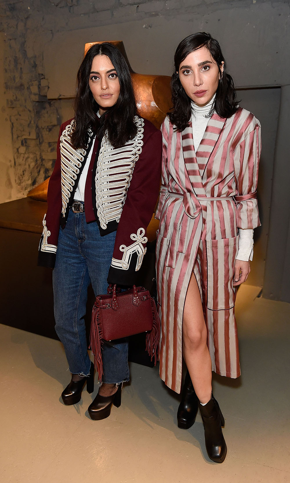 LONDON, ENGLAND - FEBRUARY 20: (L-R) Karen Wazen and Dana Hourani wearing Burberry attends the Burberry February 2017 Show during London Fashion Week February 2017 at Makers House on February 20, 2017 in London, England. (Photo by David M. Benett/Dave Benett/Getty Images for Burberry)