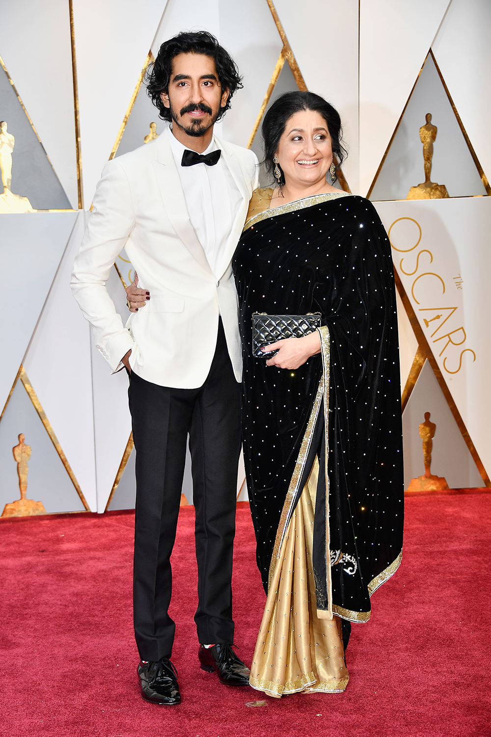 Dev Patel and his mother.