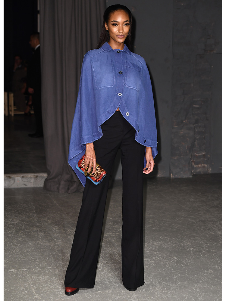 Model Jourdan Dunn wore our favourite new fashion hybrid, the shirt cape, in denim to Burberry's show at London Fashion Week.