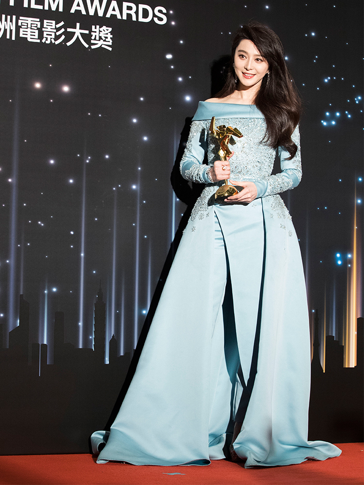 Actor and red carpet risk taker Fan Bingbing wore Elie Saab Couture in egg shell blue satin to win Best Actress for her role in I Am Not Madame Bovary at the Asian Film Awards.