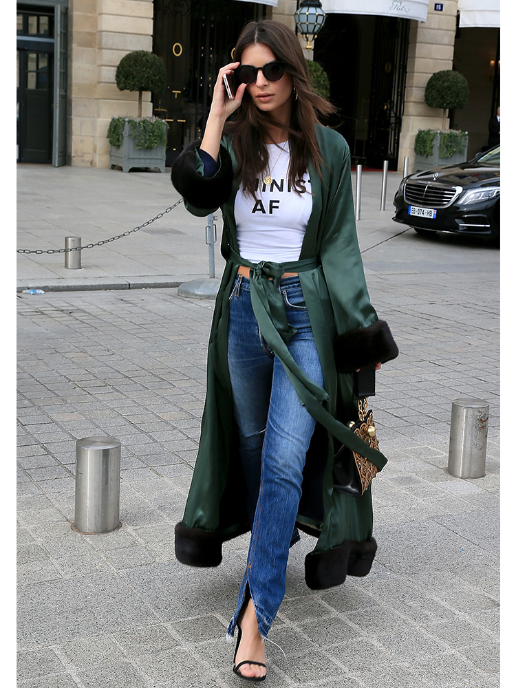 Fellow feminist Emily Ratajkowski made her message clear when she wore a t-shirt with the slogan 'Feminist AF' while visiting Paris. Paire with an emerald dressing gown with fur trim and retro shades this was no lazy Sunday outfit.