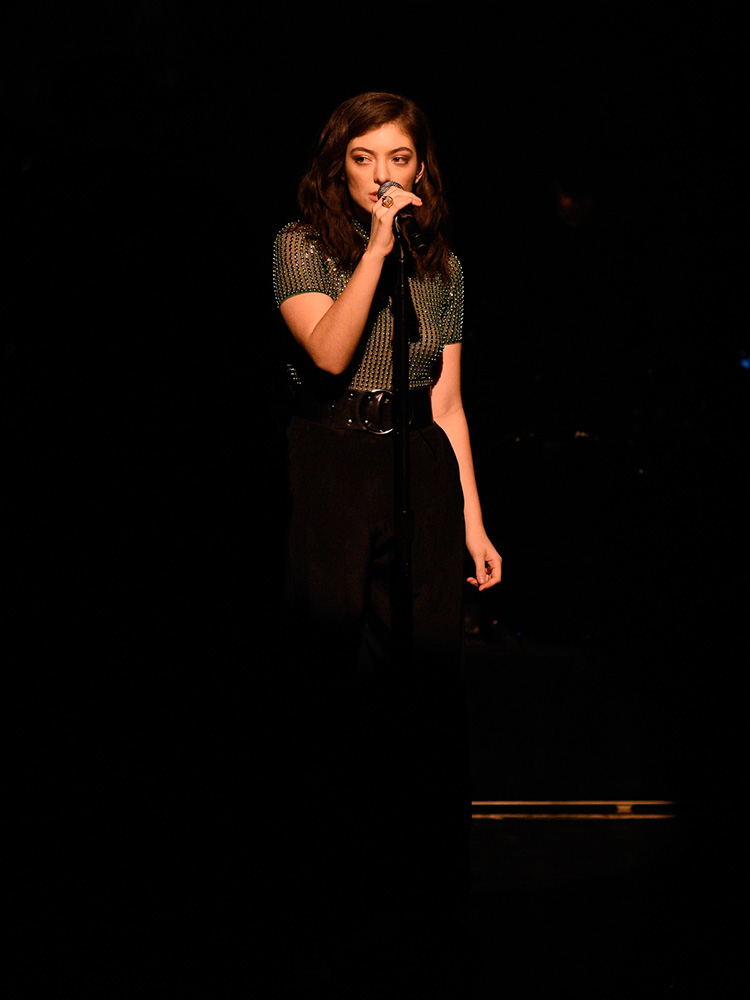 We had our eyes on more than just the dance moves during Lorde's Saturday Night Live performance. We are still madly googling to find out where her green top and statement belt came from.