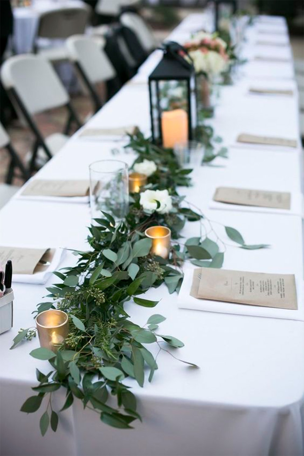 This year, forego traditional (and expensive) floral arrangements and go green. Greenery is the Pantone colour of the year and it's also stealing the show as statement-making centrepieces.