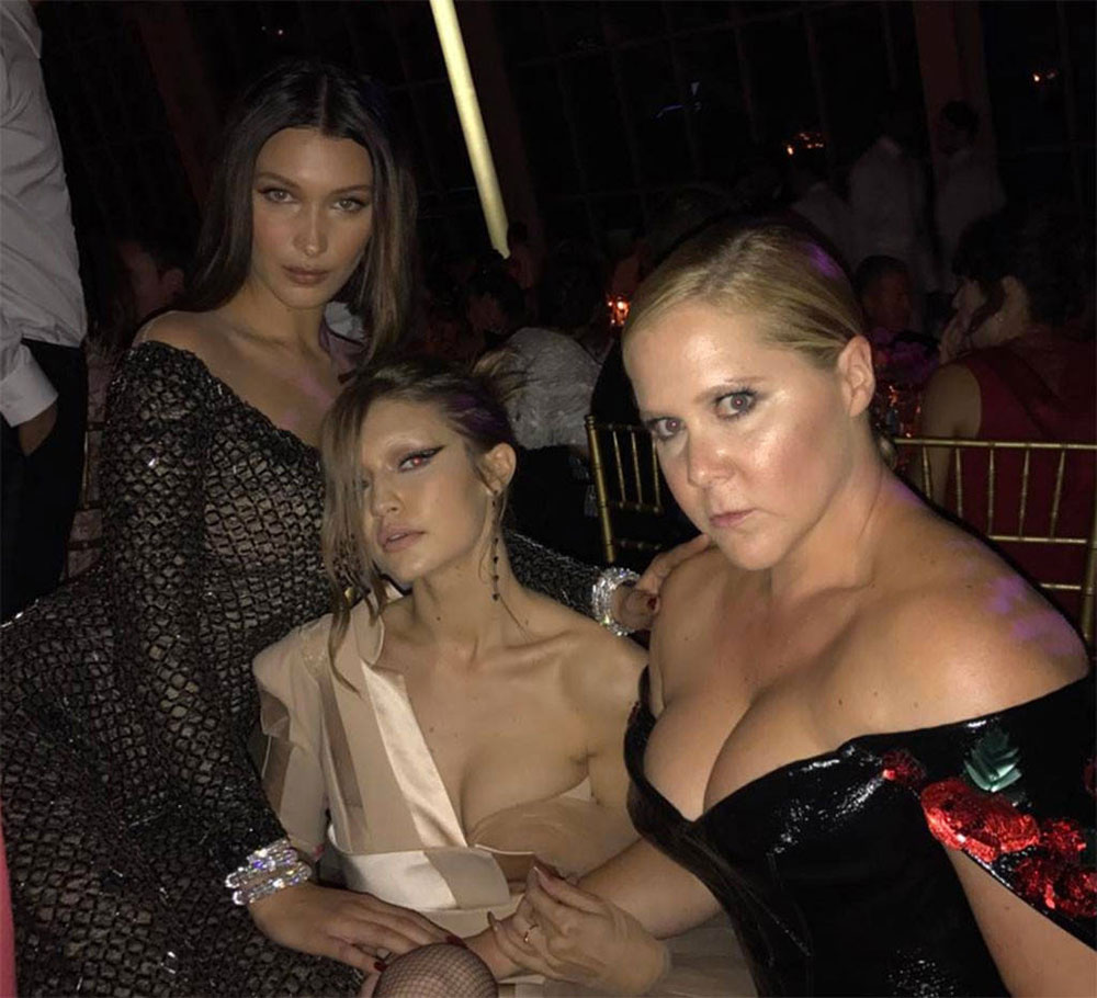Amy Schumer smizes with the Hadid sisters.