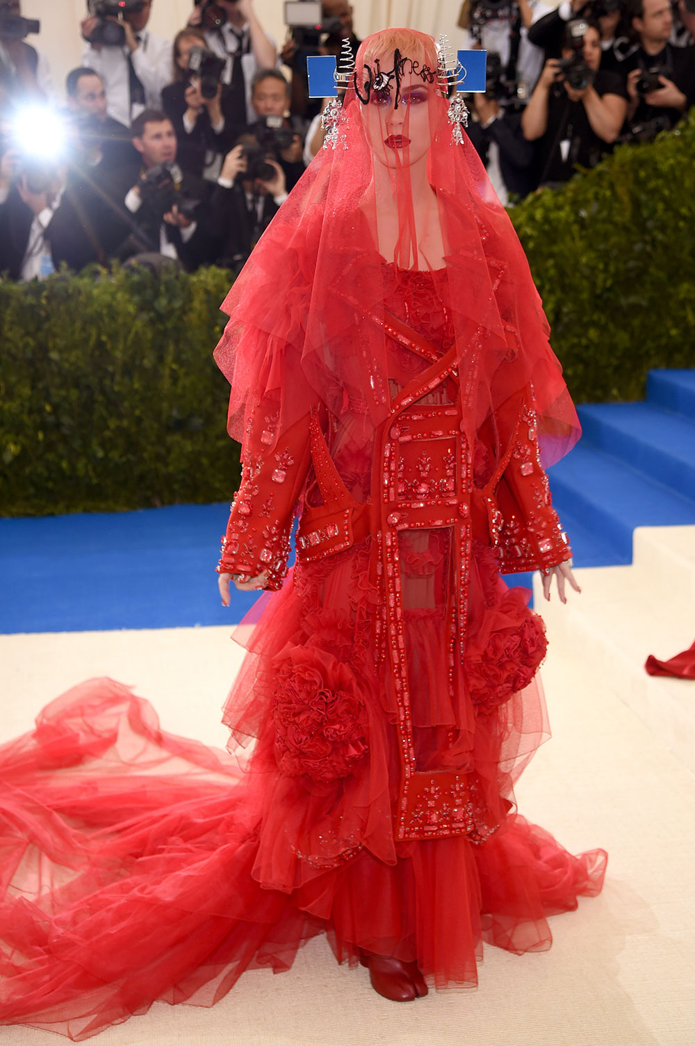 Katy Perry, who is co-hosting the event, wears custom Maison Margiela Artisanal by John Galliano.