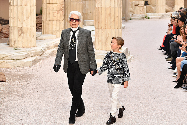PARIS, FRANCE - MAY 03: Designer Karl Lagerfeld and nephew Hudson Kroenig walk the runway during Chanel Cruise 2017/2018 Collection at Grand Palais on May 3, 2017 in Paris, France. (Photo by Pascal Le Segretain/Getty Images)