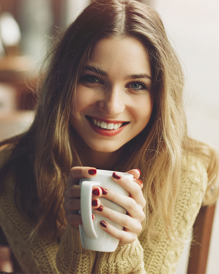 woman drinking tea winter wellness (h)