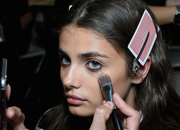 Backstage beauty fashion week Taylor Hill gets her makeup done 