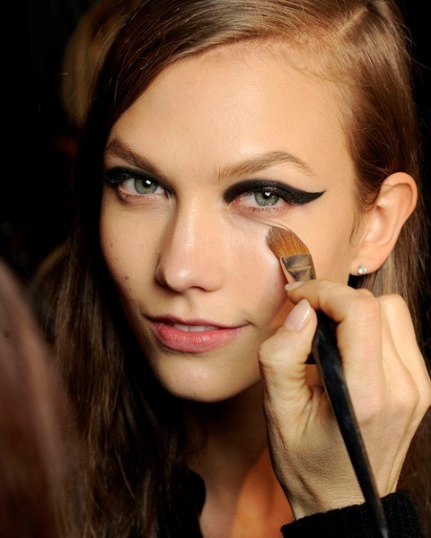 Karlie Kloss backstage at fashion week beauty