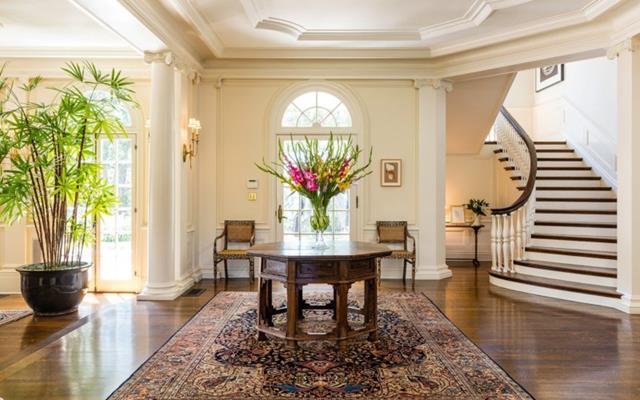 The historic neoclassical home was built in 1913 and includes a generous 1021 square metres of multiple structures set on 2.1 acres with ocean views.