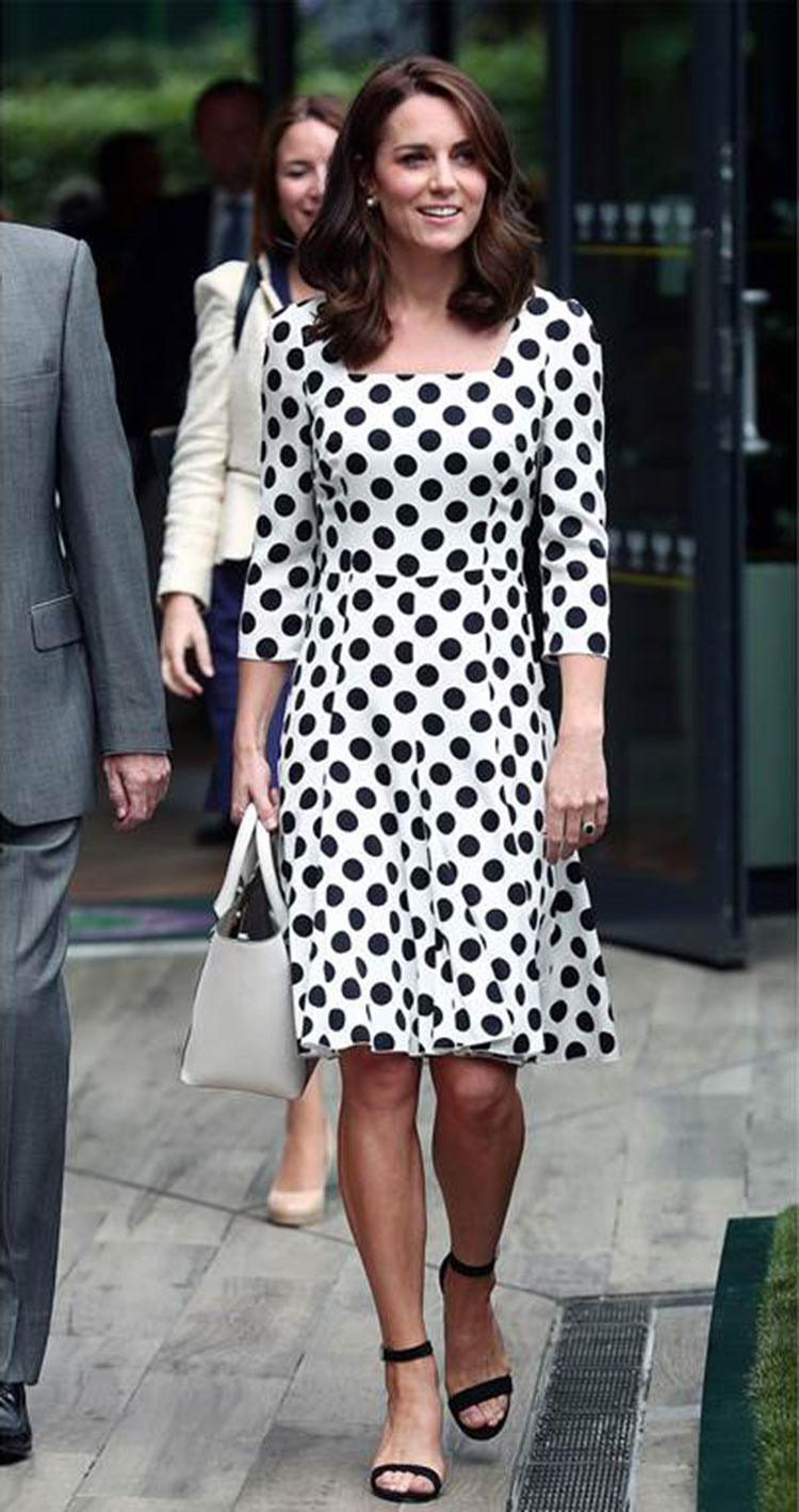 The Duchess of Cambridge dons a new hair-do and a Dolce and Gabbana polka dot dress.
