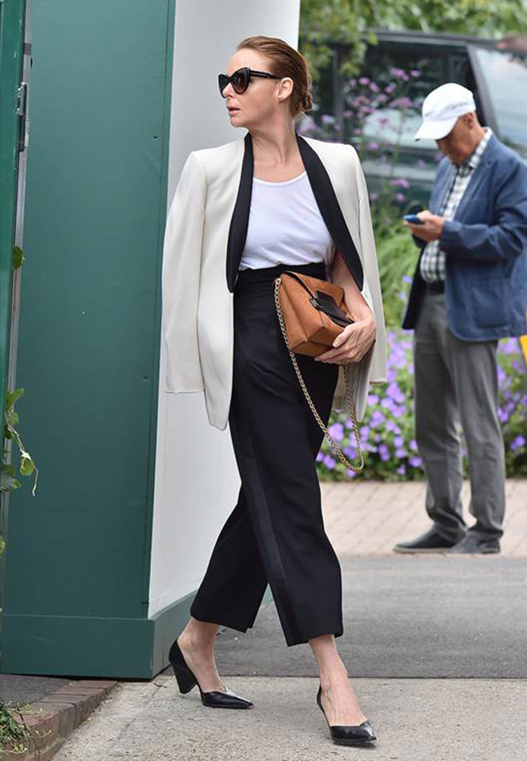 Fashion designer Stella McCartney throws a monotone blazer over a white tee for an effortless look.