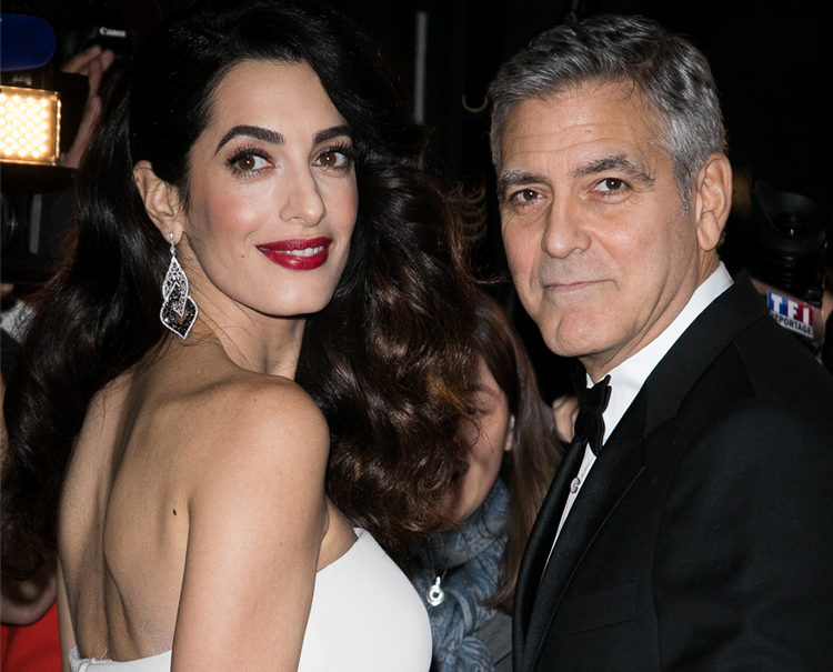 Voted the Sexiest Man Alive in 1997 and 2006, George Clooney met his match in wife Amal.