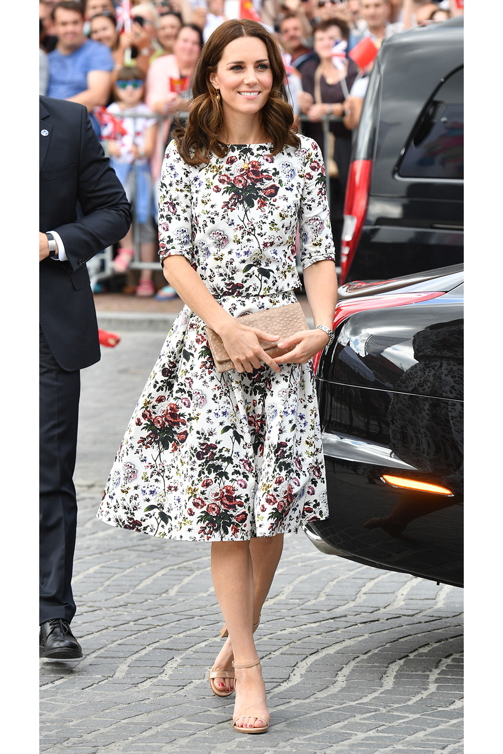 During their official visit to Germany and Poland, the Duchess of Cambridge, Catherine is seen in Poland floating in a gorgeous floral dress.