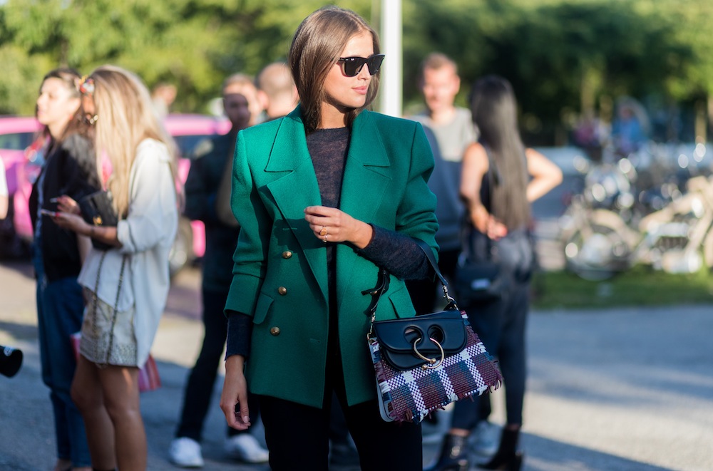 Darja Barannik wearing a green blazer jacket, JW Anderson bag outside Saks Potts on August 10, 2017 in Copenhagen, Denmark.