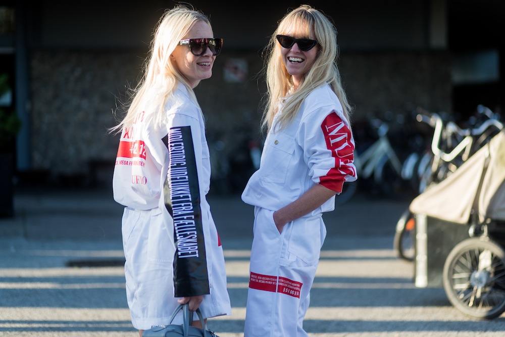 Thora Valdimars wearing MUF 10 and Balenciaga bag and Jeanette Madsen outside Saks Potts on August 10, 2017 in Copenhagen, Denmark.