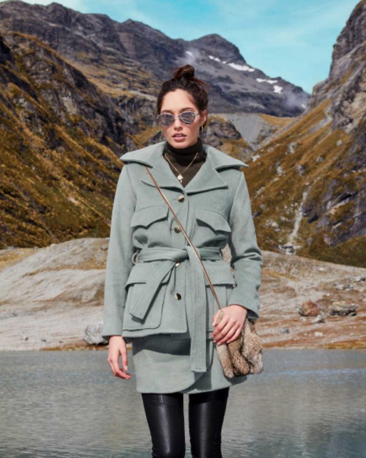 Ruby jacket, $399, and skirt, $199. Juliette Hogan turtleneck, $399. Storm pants, $179. Le Specs sunglasses, $129. Lapin bag (made with ethically sourced NZ fur), $450.
