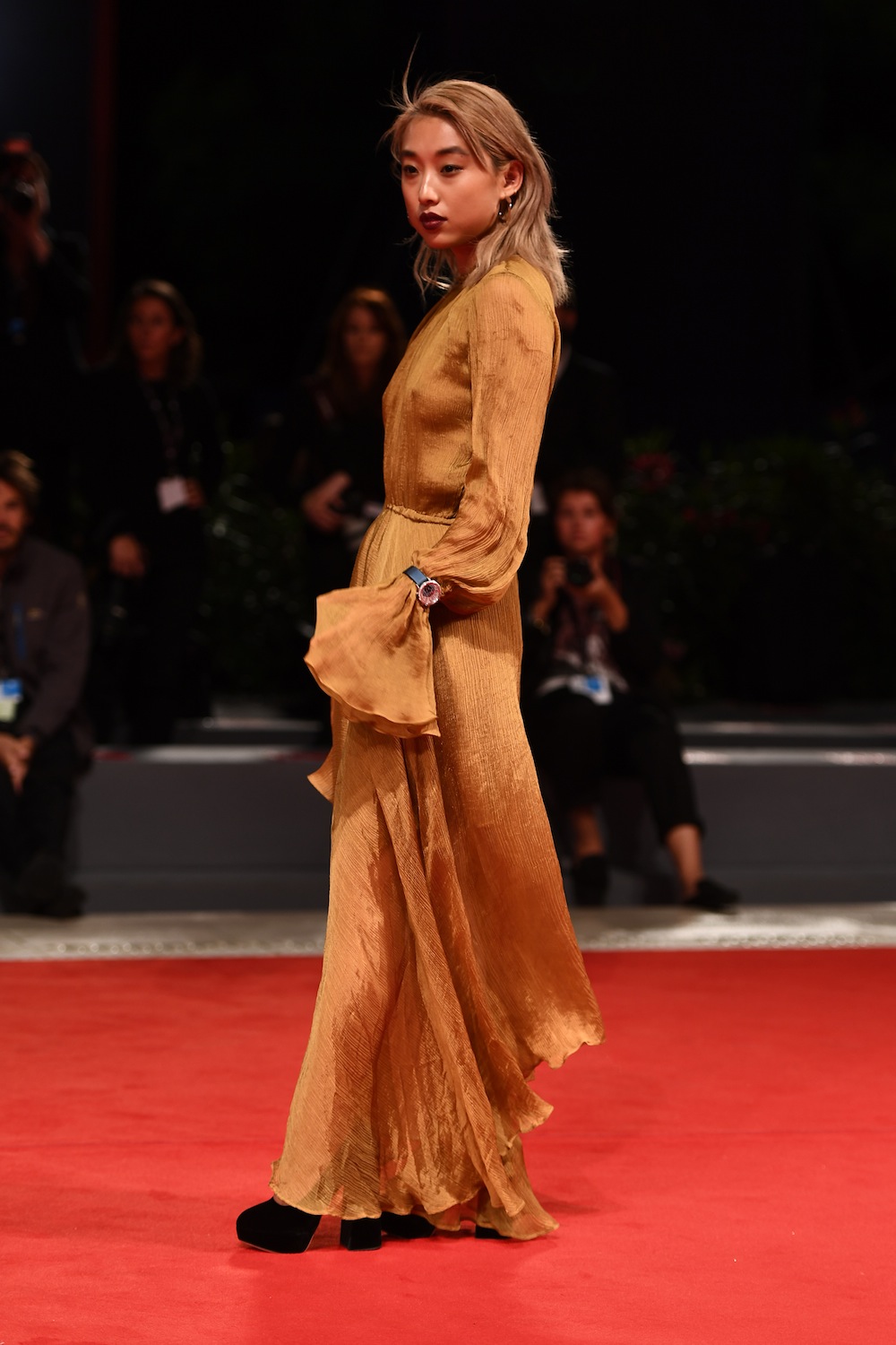 Margaret Zhang wearing a Jaeger-LeCoultre Rendez-Vous Moon watch walks the red carpet of the 'Victoria & Abdul' premiere and before The Jaeger-LeCoultre Glory To The Filmmaker Award ceremony during the 74th Venice International Film Festival at Sala Grande
