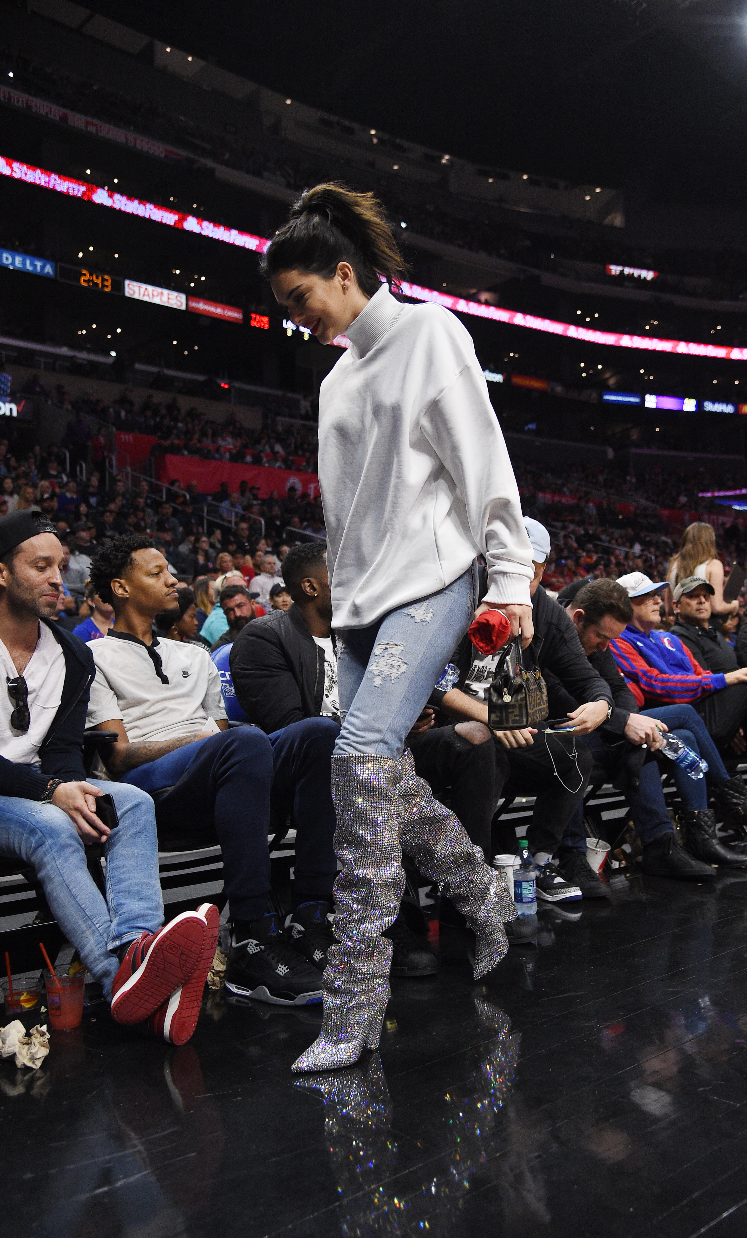 LOS ANGELES, CA - NOVEMBER 4: Kendall Jenner wearing a pair of $10,000 Saint Laurent boots attends the LA Clippers and Memphis Grizzlies basketball game at Staples Center November 4 2017, in Los Angeles, California. (Photo by Kevork Djansezian/Getty Images)