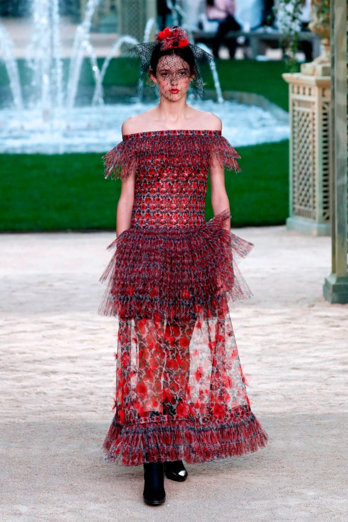 A model presents a creation for Chanel during the 2018 spring/summer Haute Couture collection fashion show on January 23, 2018 in Paris. / AFP PHOTO / Patrick KOVARIK (Photo credit should read PATRICK KOVARIK/AFP/Getty Images)