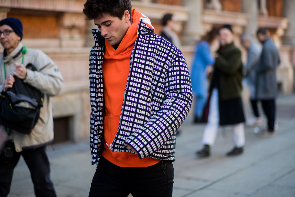 MILAN, ITALY - JANUARY 14: Marc Forne wearing MSGM down feather jacket is seen outside MSGM during Milan Men's Fashion Week Fall/Winter 2018/19 on January 14, 2018 in Milan, Italy. (Photo by Christian Vierig/Getty Images)