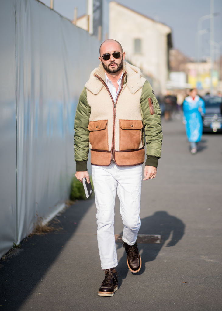 MILAN, ITALY - JANUARY 14: Milan Vukmirovic wearing white pants, bomber jacket is seen outside DSquared2 during Milan Men's Fashion Week Fall/Winter 2018/19 on January 14, 2018 in Milan, Italy. (Photo by Christian Vierig/Getty Images)