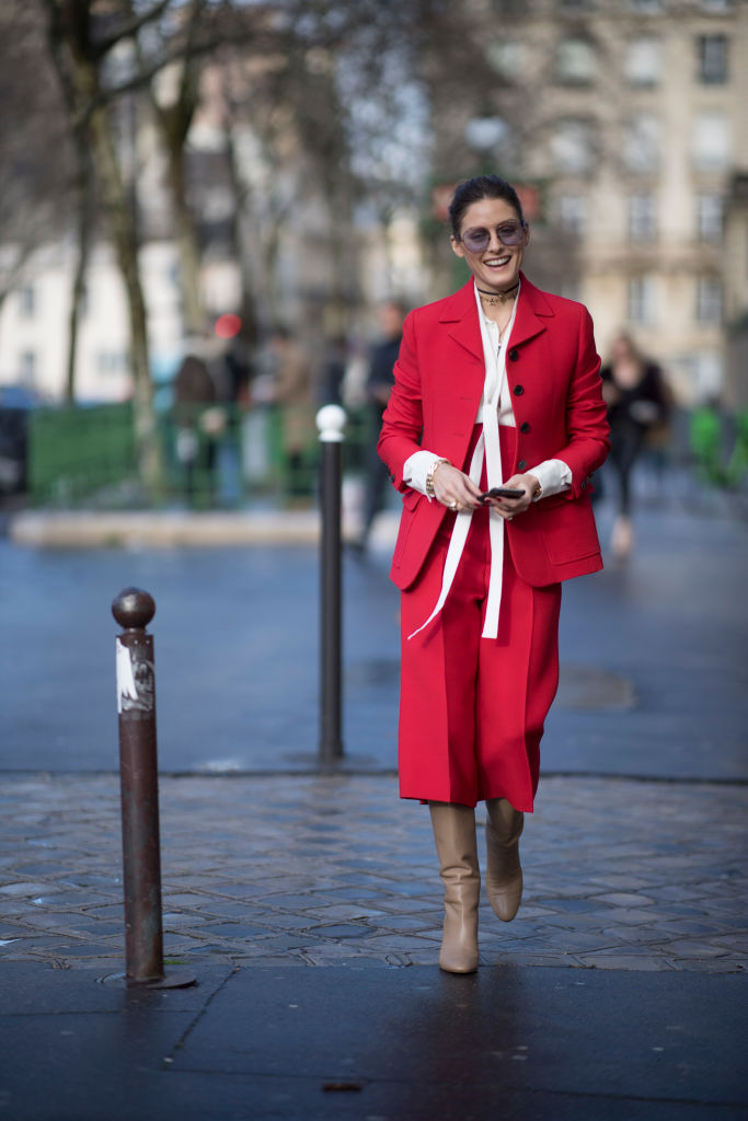 PARIS, FRANCE - JANUARY 22: Oliva Palermo seen wearing a red pants and red jacket during the Haute Couture Spring/Summer 2018 in the streets of Paris on January 22, 2018 in Paris, France. (Photo by Timur Emek/Getty Images)