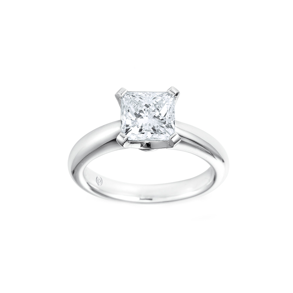 Partridge Jewellers, Princess Louise, POE Crafted In Platinum The Heavy 4 Claw Setting Showcases A Princess Cut Diamond With A Weighty Half Round Shank.