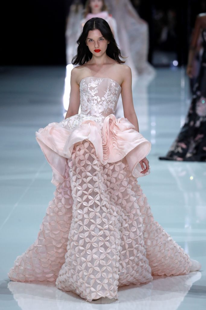 A model presents a creation for Ralph & Russo during the 2018 spring/summer Haute Couture collection on January 22, 2018 in Paris. / AFP PHOTO / Patrick KOVARIK (Photo credit should read PATRICK KOVARIK/AFP/Getty Images)