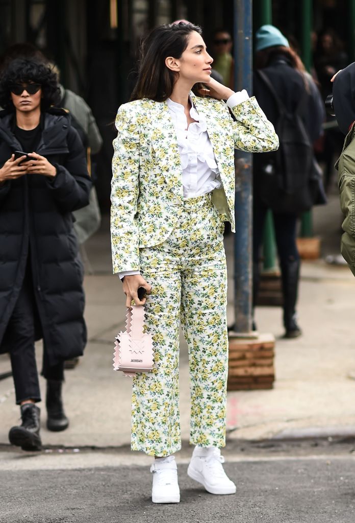 NEW YORK, NY - FEBRUARY 12: A guest is seen wearing a Zimmermann suit outside the Zimmermann show during New York Fashion Week: Women's A/W 2018 on February 12, 2018 in New York City. (Photo by Daniel Zuchnik/Getty Images)