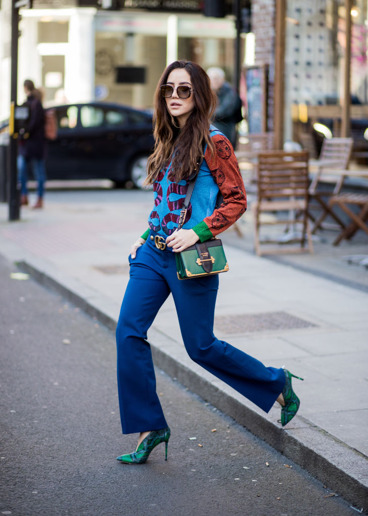 LONDON, ENGLAND - FEBRUARY 17: Tamara Kalinic wearing blue pants, Gucci, green heels, Gucci sweater, green Prada bag seen outside J.W. Anderson during London Fashion Week February 2018 on February 17, 2018 in London, England. (Photo by Christian Vierig/Getty Images)