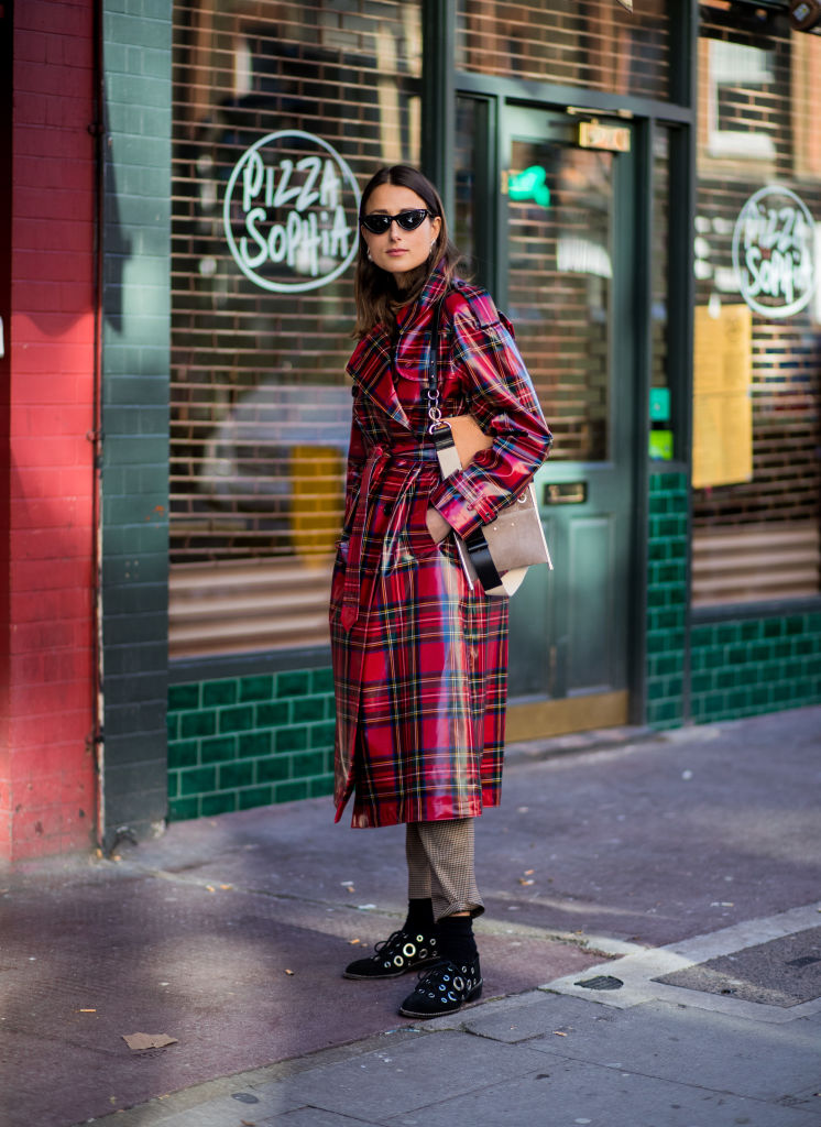 LONDON, ENGLAND - FEBRUARY 17: Julia Haghjoo wearing red black plaid Burberry coat seen outside J.W. Anderson during London Fashion Week February 2018 on February 17, 2018 in London, England. (Photo by Christian Vierig/Getty Images)