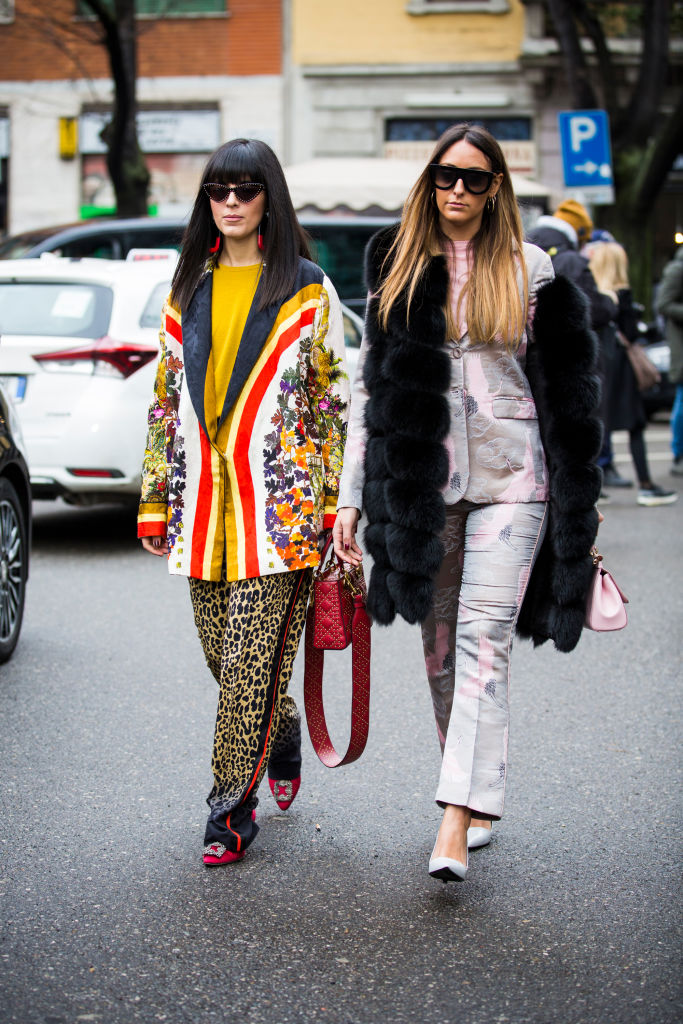 MILAN, ITALY - FEBRUARY 24: Laura Comolli and Elisa Taviti are seen outside Giorgio Armani show during Milan Fashion Week Fall/Winter 2018/19 on February 24, 2018 in Milan, Italy. (Photo by Claudio Lavenia/Getty Images)