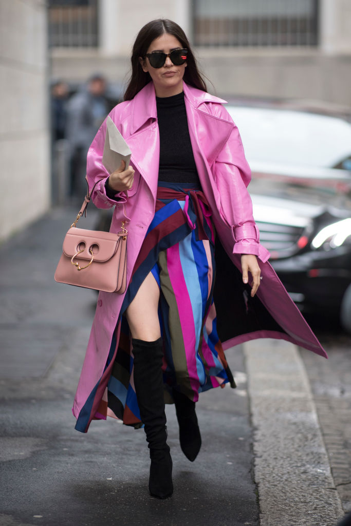 MILAN, ITALY - FEBRUARY 24: A guest seen wearing a pink coat in the streets of Milan during Milan Fashion Week Fall/Winter 2018/19 on February 24, 2018 in Milan, Italy. (Photo by Timur Emek/Getty Images)
