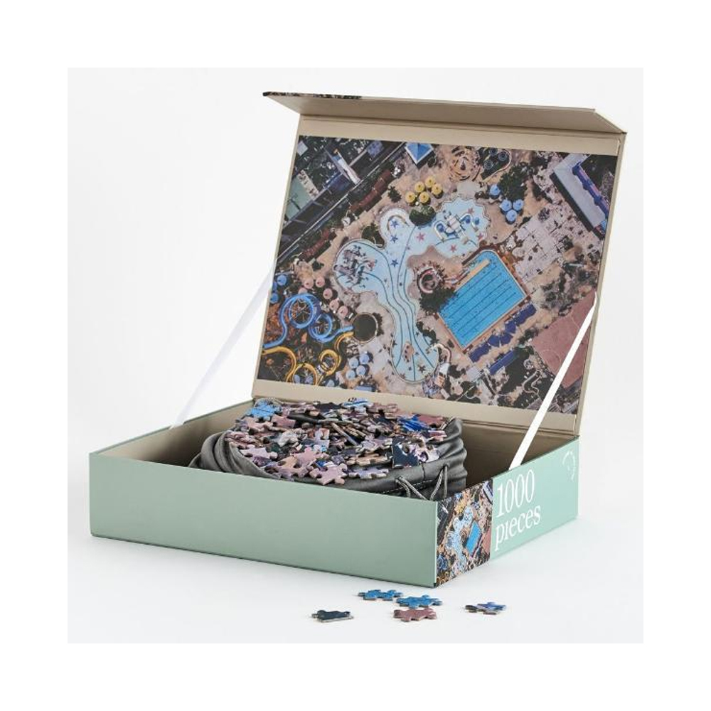 Valentine’s Day gift ideas for your S/O that are romantic in a non-cheesy kind of way | Journey of Something 1000 Piece Art Puzzle – Waterpark Edition, $80 from Shut the Front Door
