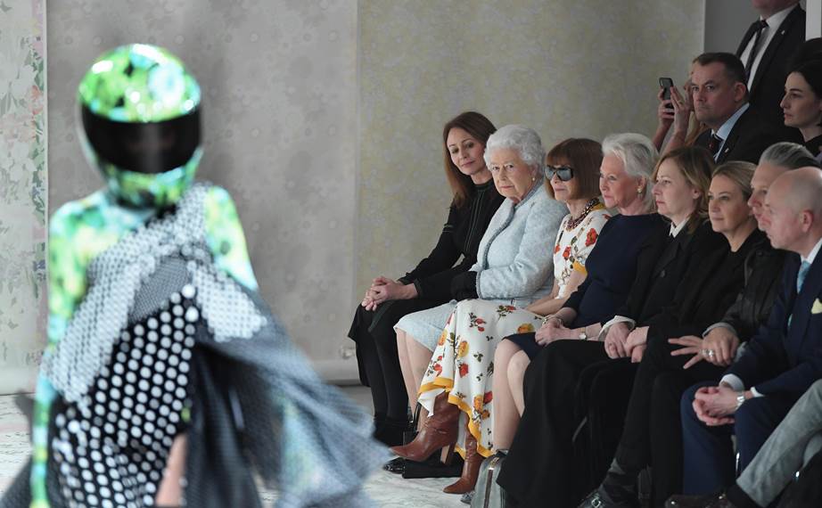 Queen makes an appearance on front row of London Fashion Week