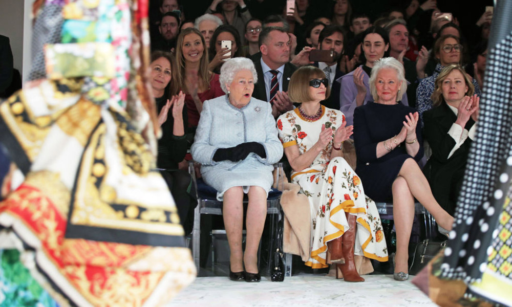 Queen makes an appearance on front row of London Fashion Week